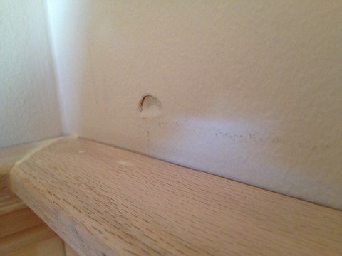 While the work was fun, I made mistakes... like this one, where I hit the wall with my hammer.  