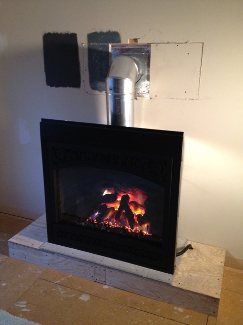 Because I'm not comfortable hooking up natural gas, we paid a contractor to do the rough install of the firebox.