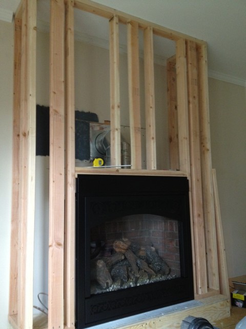 Once the firebox was installed, I framed out the fireplace.